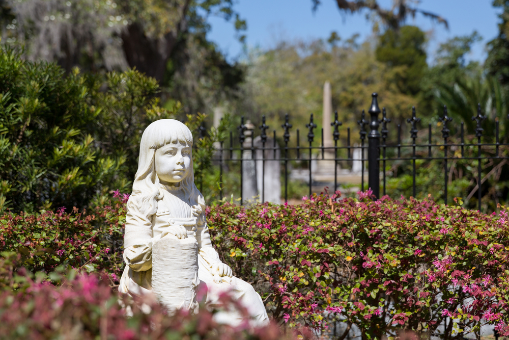 Little Gracie statue in historic Bonaventure Cemetery, Savannah Georgia. The life-size sculpture dates to 1889 and is a well-known Savannah tourist destination.