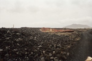 A lonely shipwreck lying in the middle of a lava field along horse trail, Iceland