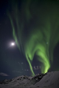 Northern Lights in Iceland forming a lime-green pattern
