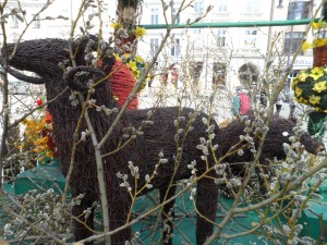 A rustic display of pussy willows and animals made of sticks at Krakow's market