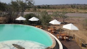 The pool with the river in the background at Azura Selous