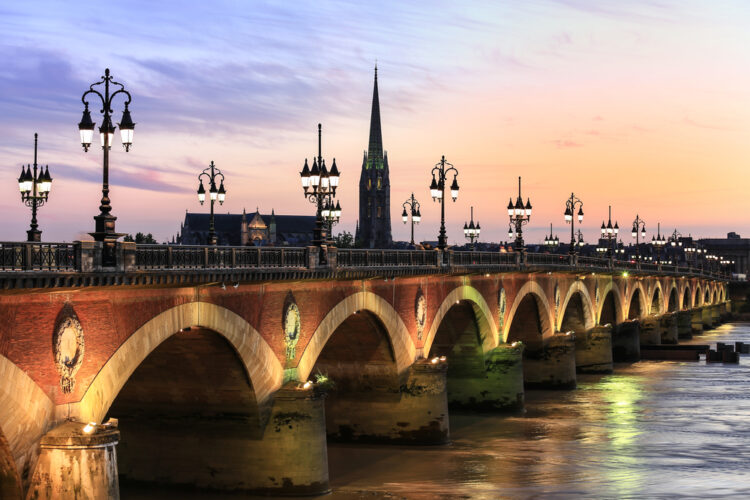 Pont de Pierre bridge with St Michel cathedral