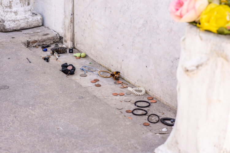 Gifts left at Marie Catherine Laveau's tomb