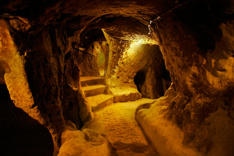 The Derinkuyu underground city is an ancient multi-level cave city in Cappadocia, Turkey.