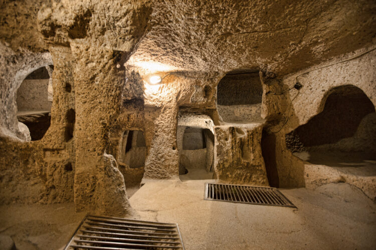 The Derinkuyu underground city is an ancient multi-level cave city in Cappadocia, Turkey.