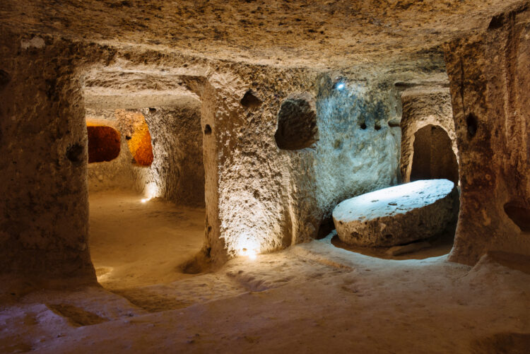 The Derinkuyu underground city is an ancient multi-level cave city in Cappadocia, Turkey.
