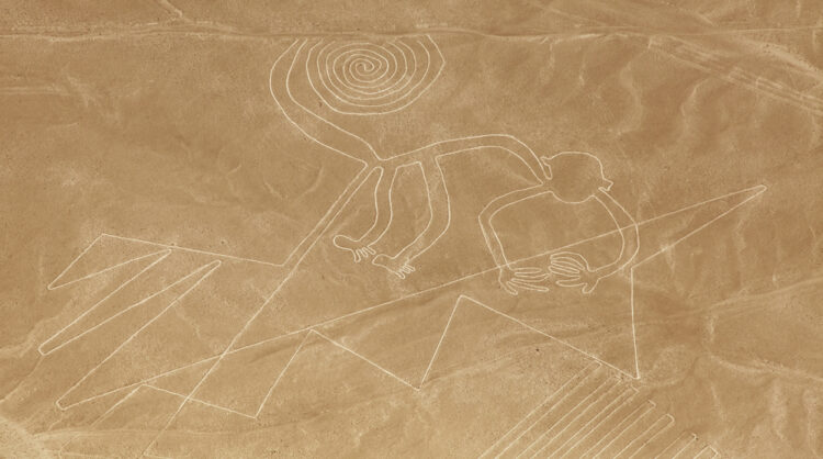 Monkey geoglyph, Nazca or Nasca mysterious lines and geoglyphs aerial view, landmark in Peru