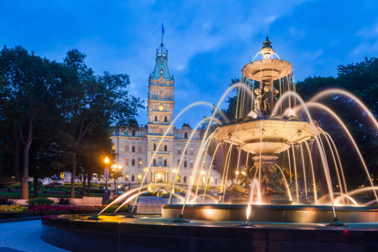 The Quebec Parliament Building and the Fontaine de Tourny at twilight 