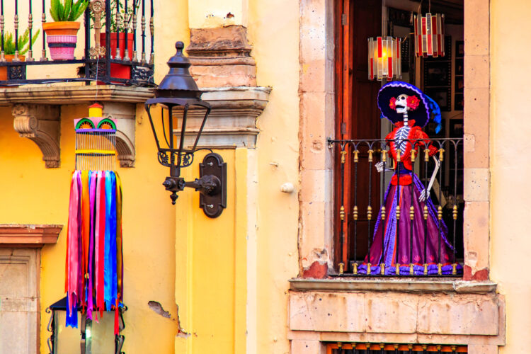 An elegantly-dressed skeleton figure used as a symbol of the Day of the Dead