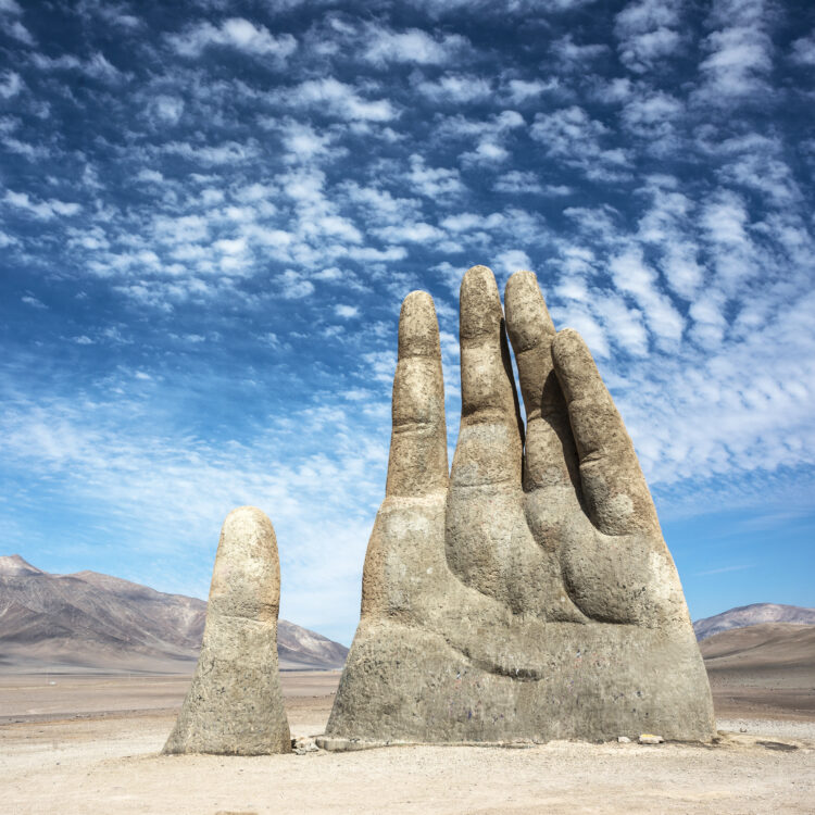 La Mano del Desierto by Chilean sculptor Mario Irarrázabal