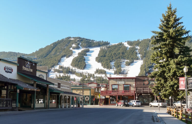 Ski slopes in Jackson Hole with panorama of vintage houses