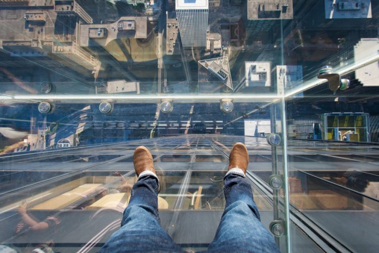 Willis Tower skydeck, with downtown Chicago visible beneath the glass floor