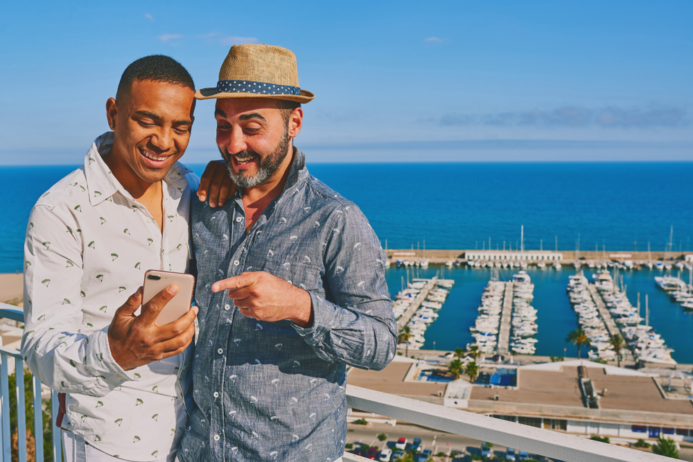 Gay couple near ocean