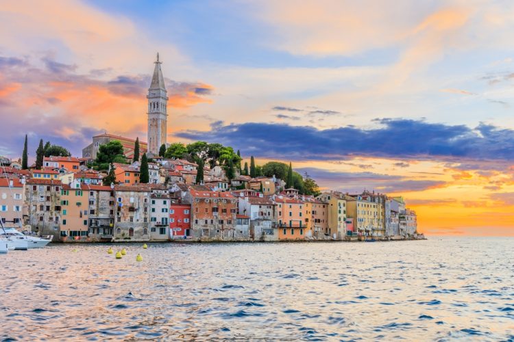 The Best Seaside Cities in Istria, Croatia Rovinj, Croatia. Sunset view of old town on the western coast of the Istrian peninsula.