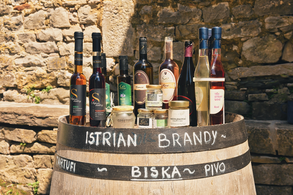 Selection of Istrian wines and Biska outside the restaurant in Hum