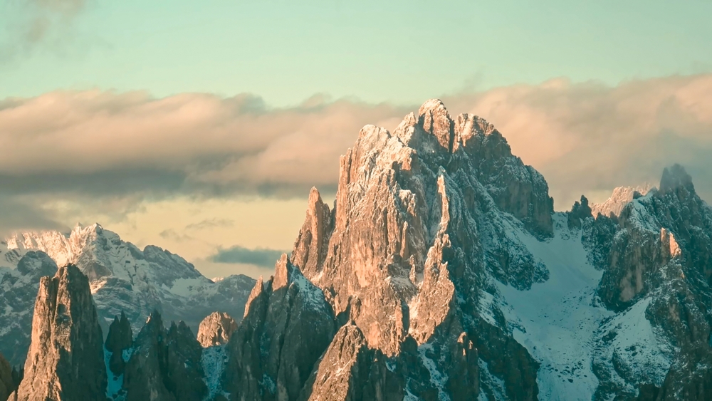 jagged peaks of the Italian Dolomites during a winter sunse